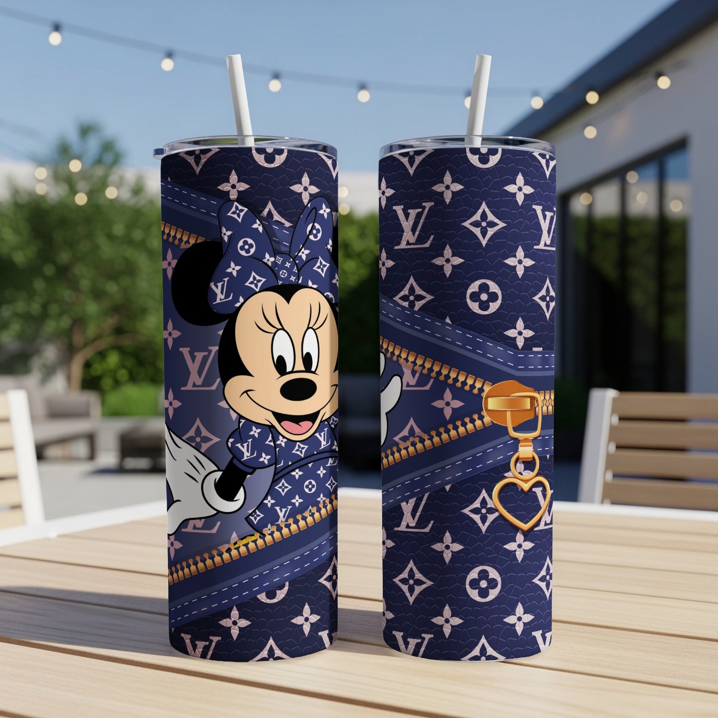 Minnie Mouse on navy blue Louis Vuitton print tumbler with gold zipper and heart charm.