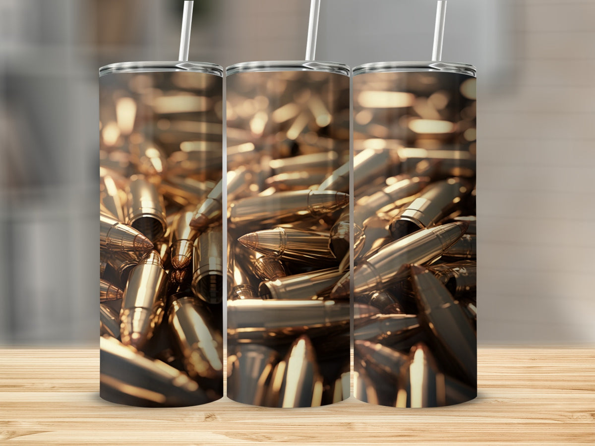 Three tumblers with a close-up design of shiny, gold bullets and straws.