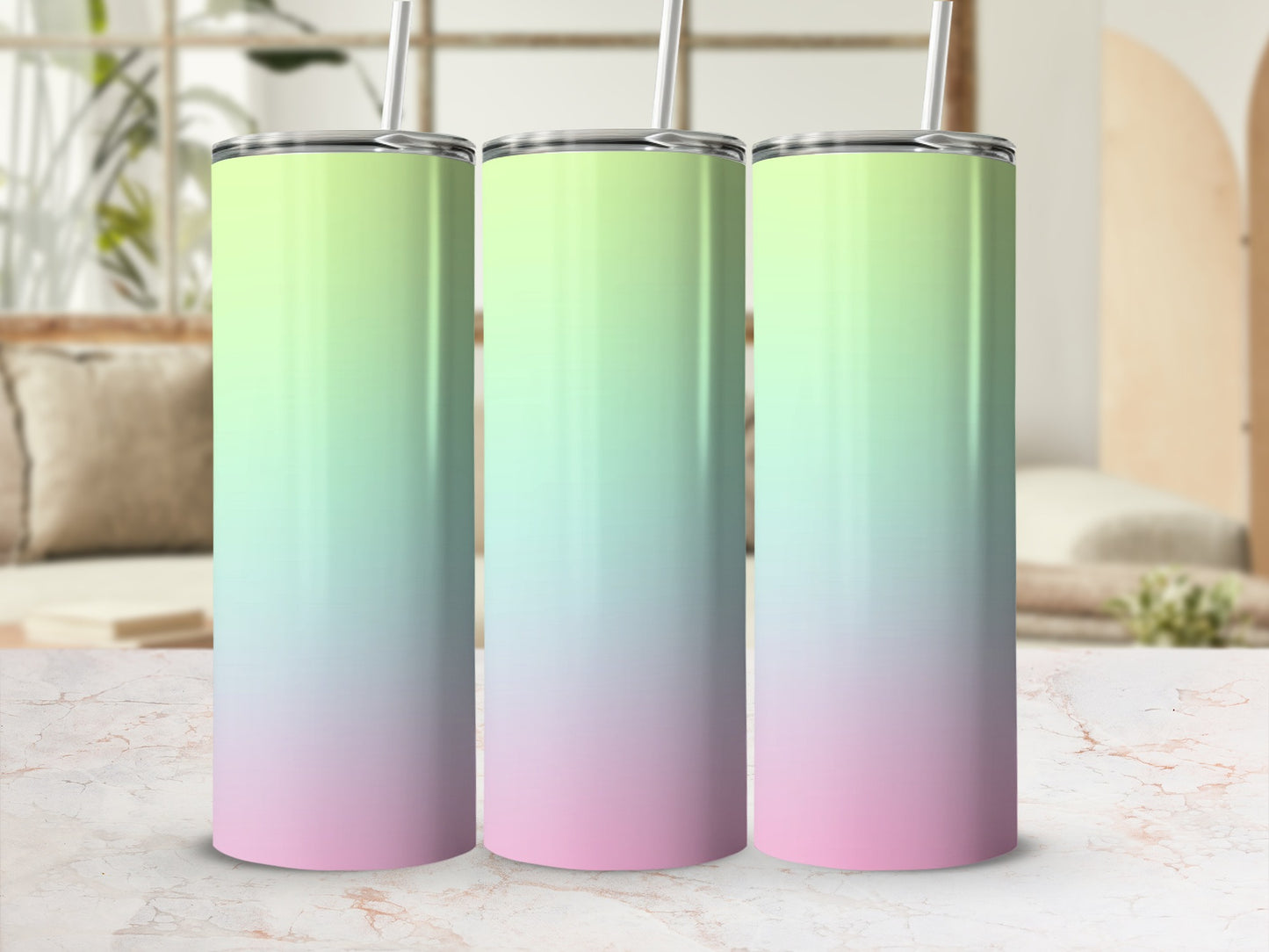 Three gradient tumblers with straws, pale green to pink.