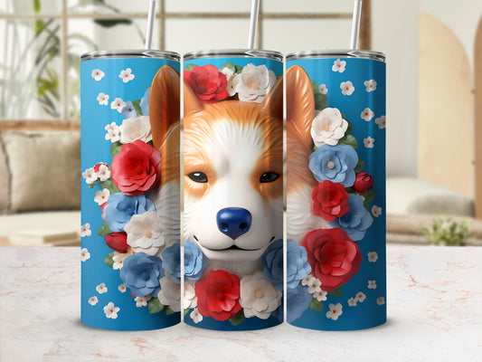 Corgi dog face with red and blue flowers on a blue tumbler with straws.