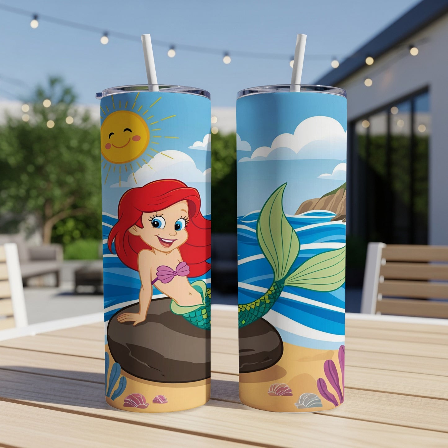 Mermaid with pink hair on rock, and mermaid tail design on a skinny tumbler.