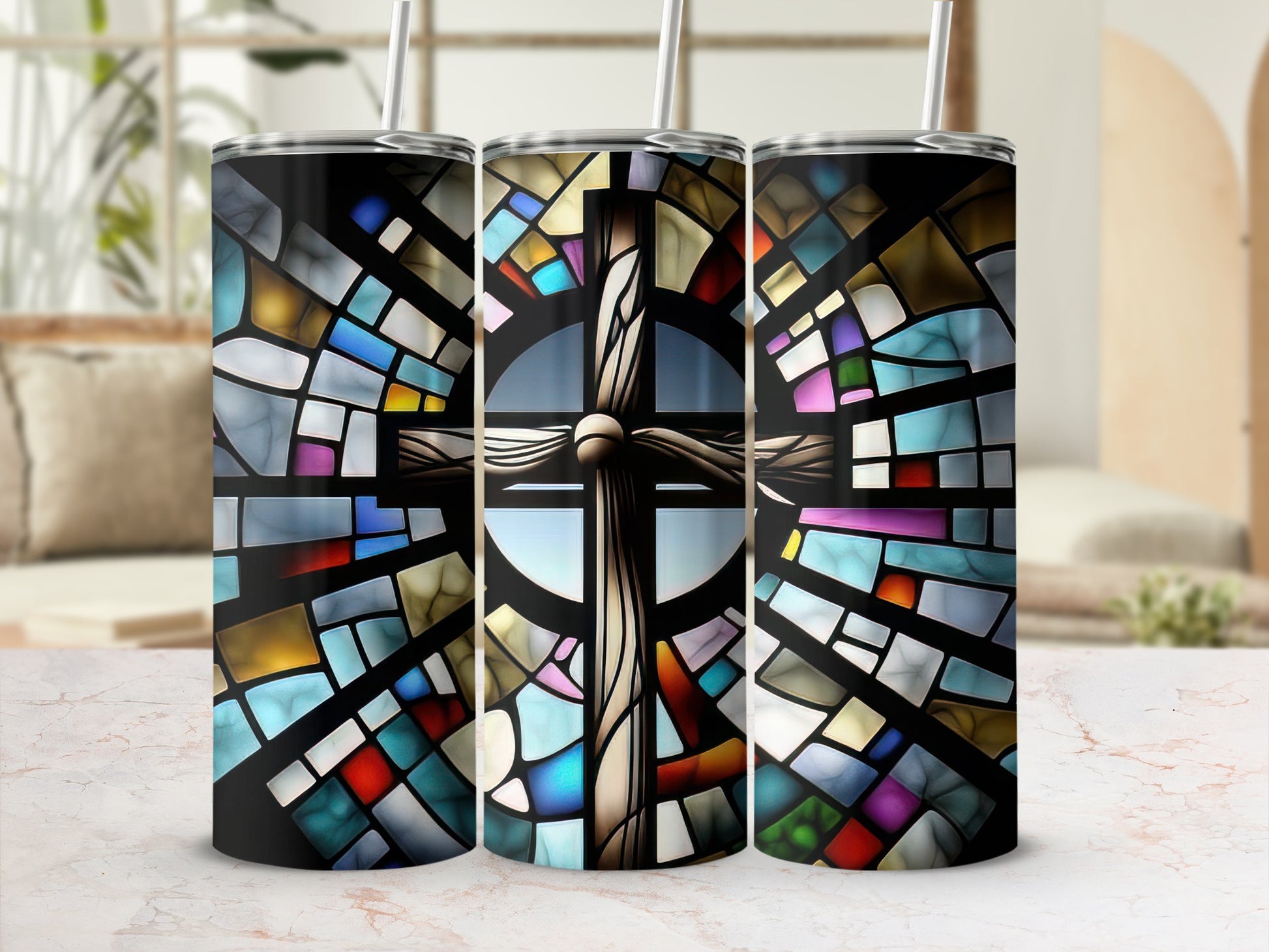 Three tumblers featuring a stained-glass cross design.
