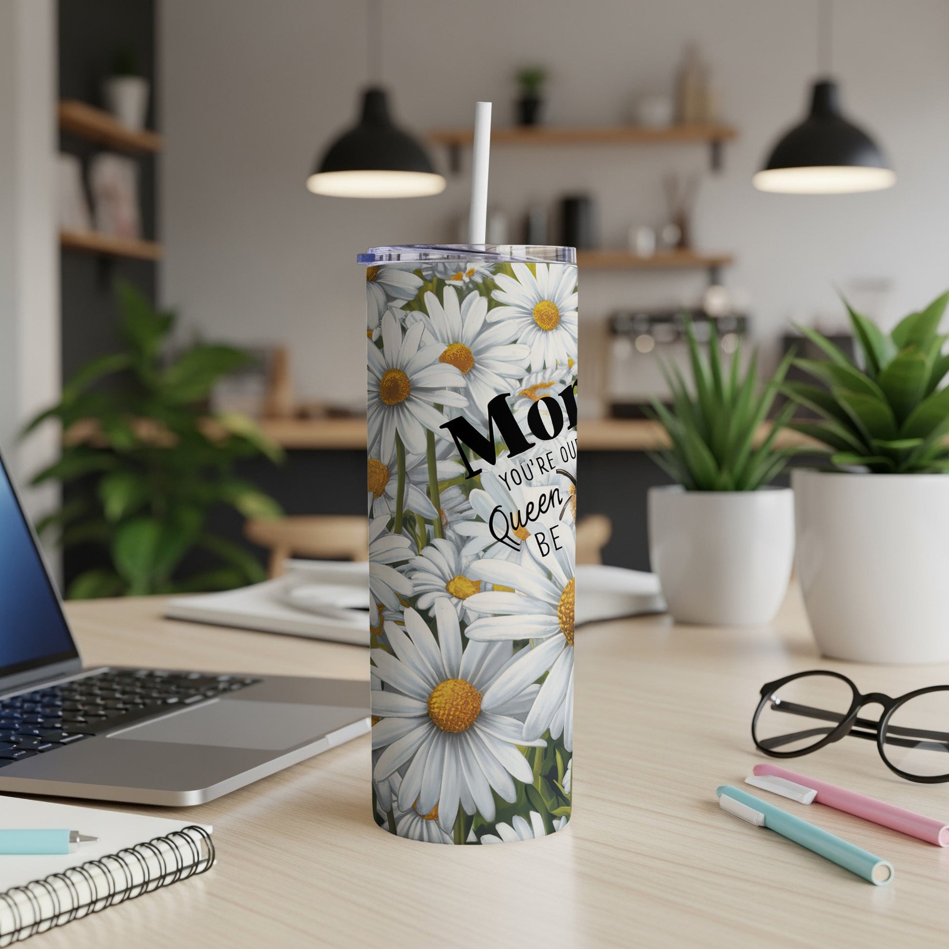 White daisy floral pattern tumbler with "Mom You're Our Queen" text.