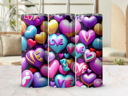 Three tumblers with colorful heart designs and the word "love."