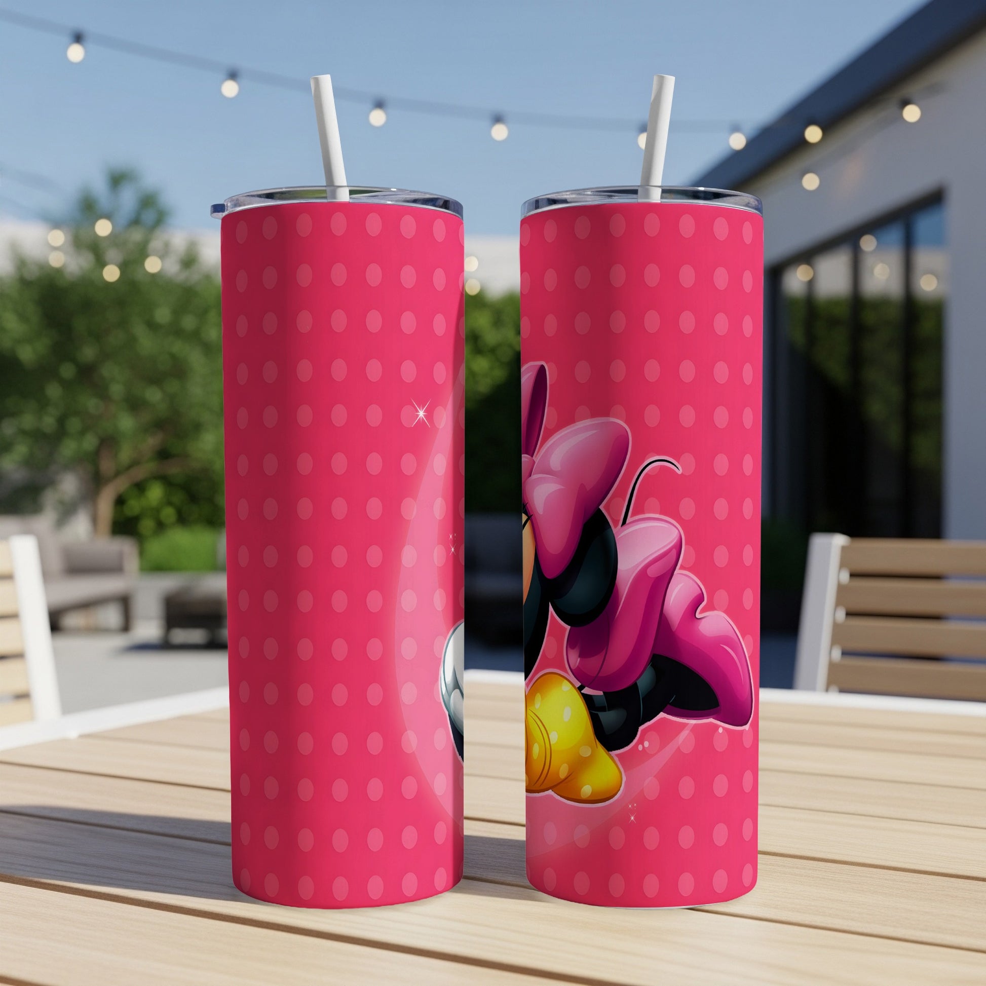 Minnie Mouse on a pink polka dot tumbler with a straw.