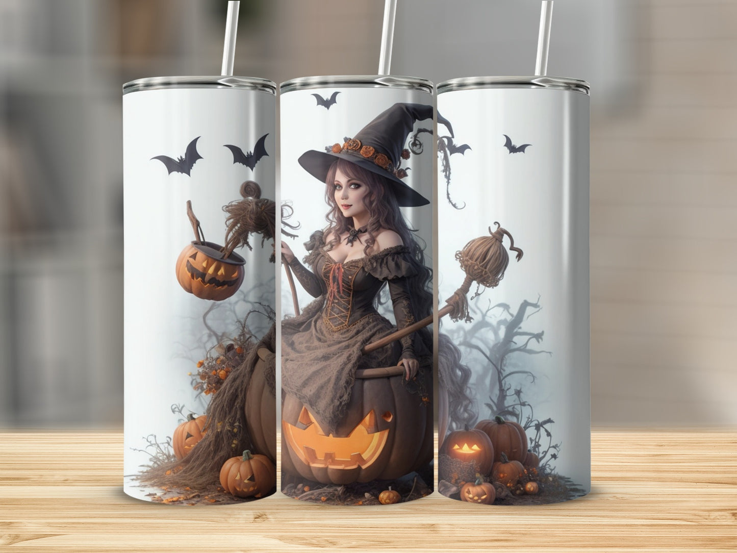 Halloween tumblers with witch, pumpkins, bats, and spooky tree graphics.