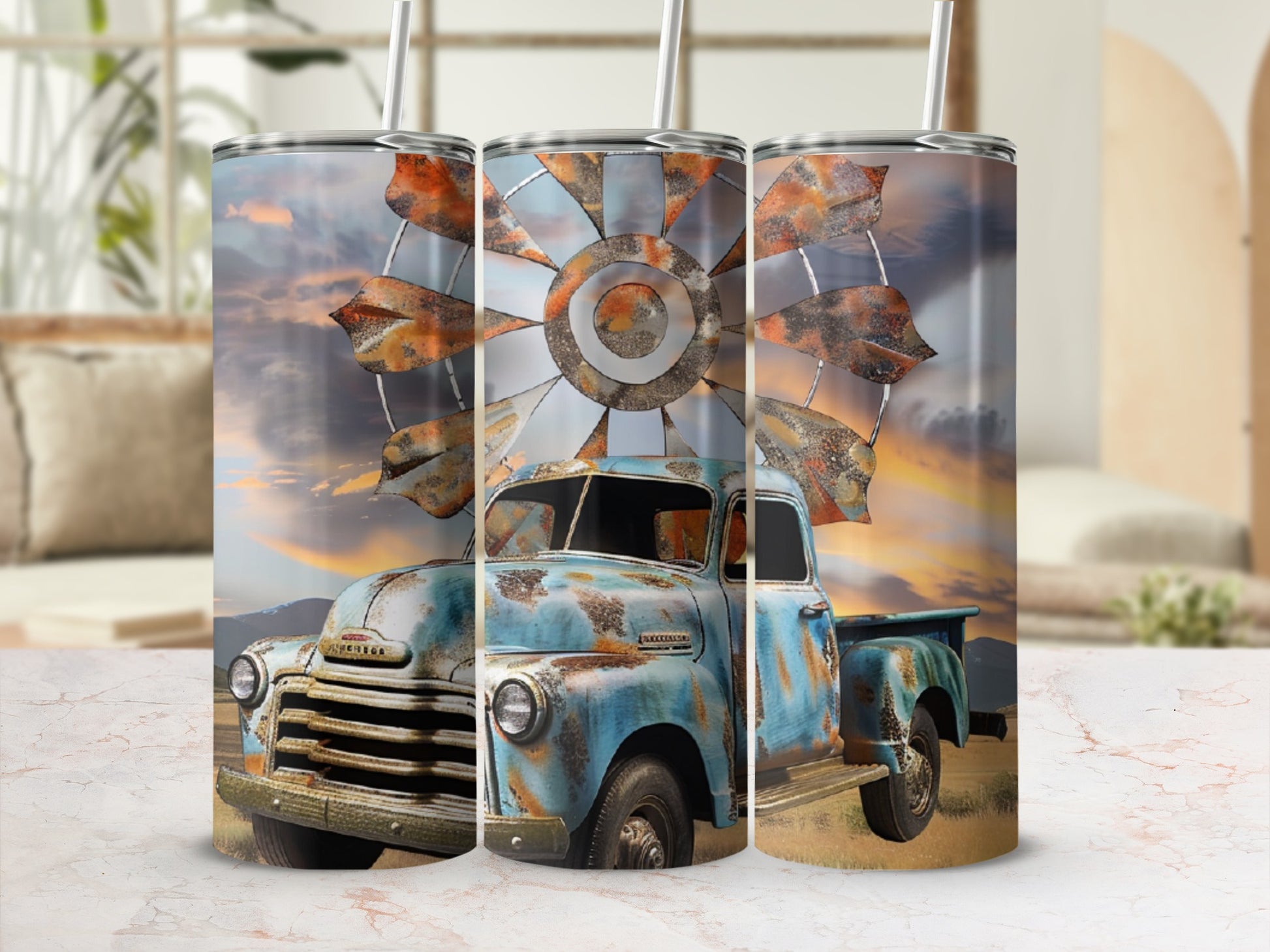 Triptych of rustic blue truck with rusty windmill at sunset.