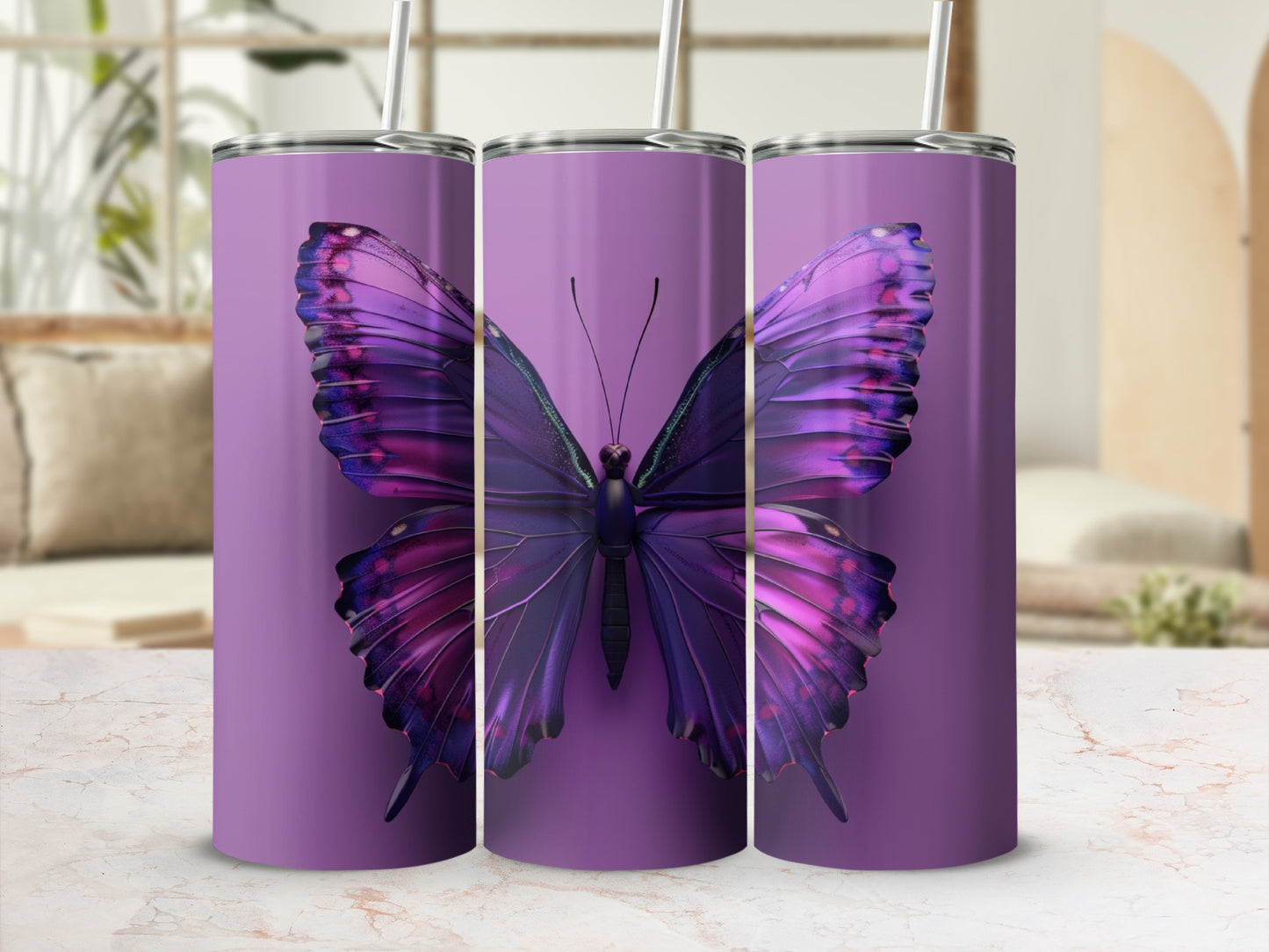 Purple butterfly tumbler with straw on a marble surface.