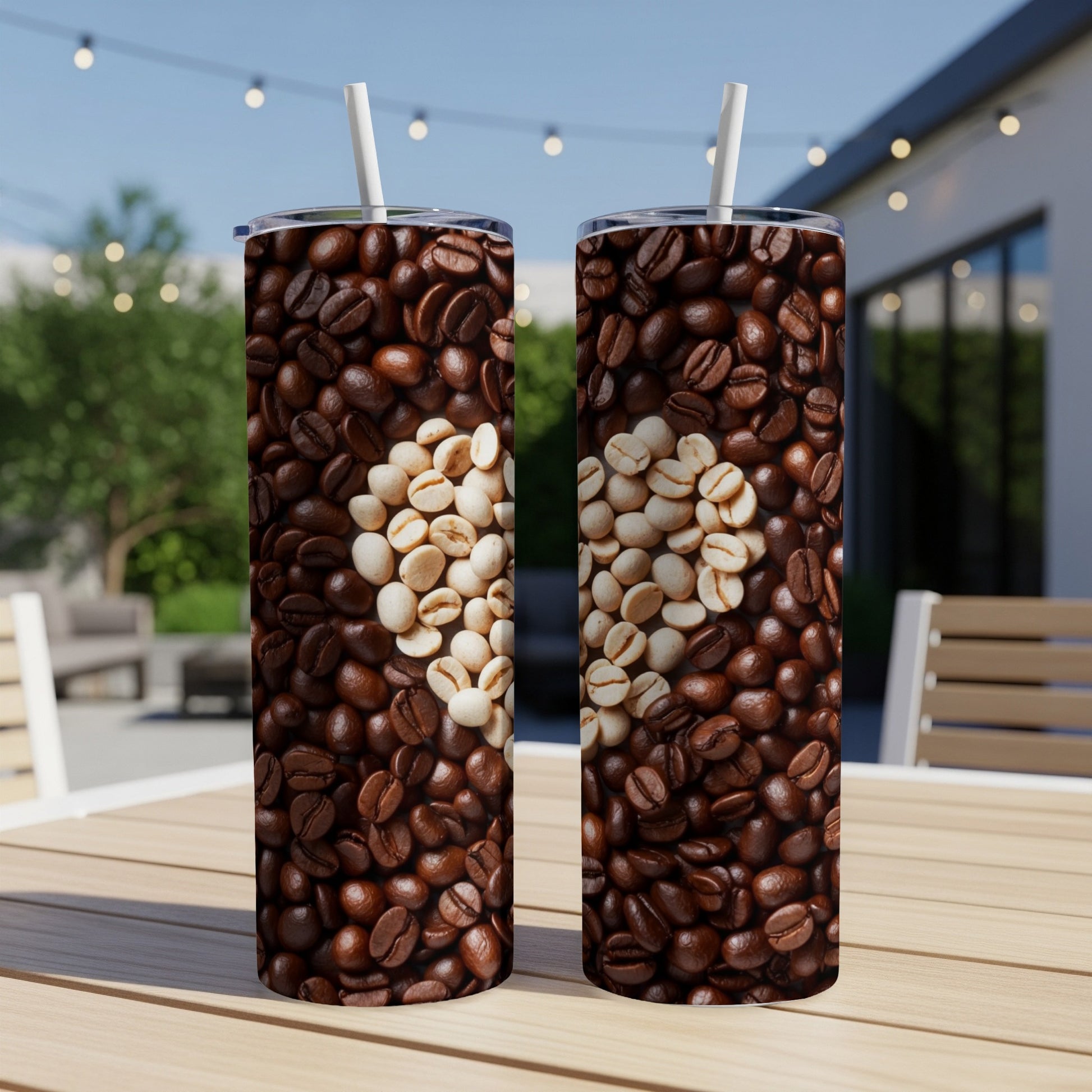 Two coffee tumblers with a heart design made of coffee beans.