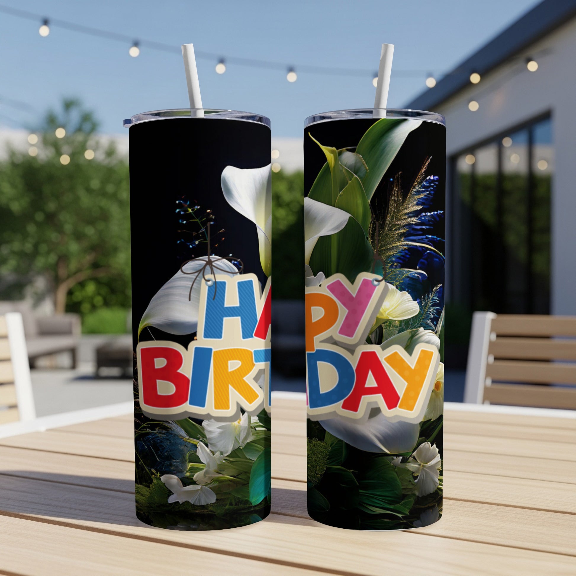 Two tumblers with "Happy Birthday" in colorful block letters and floral accents.