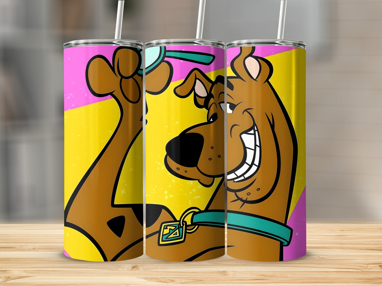 Scooby-Doo cartoon character on a pink and yellow striped tumbler.