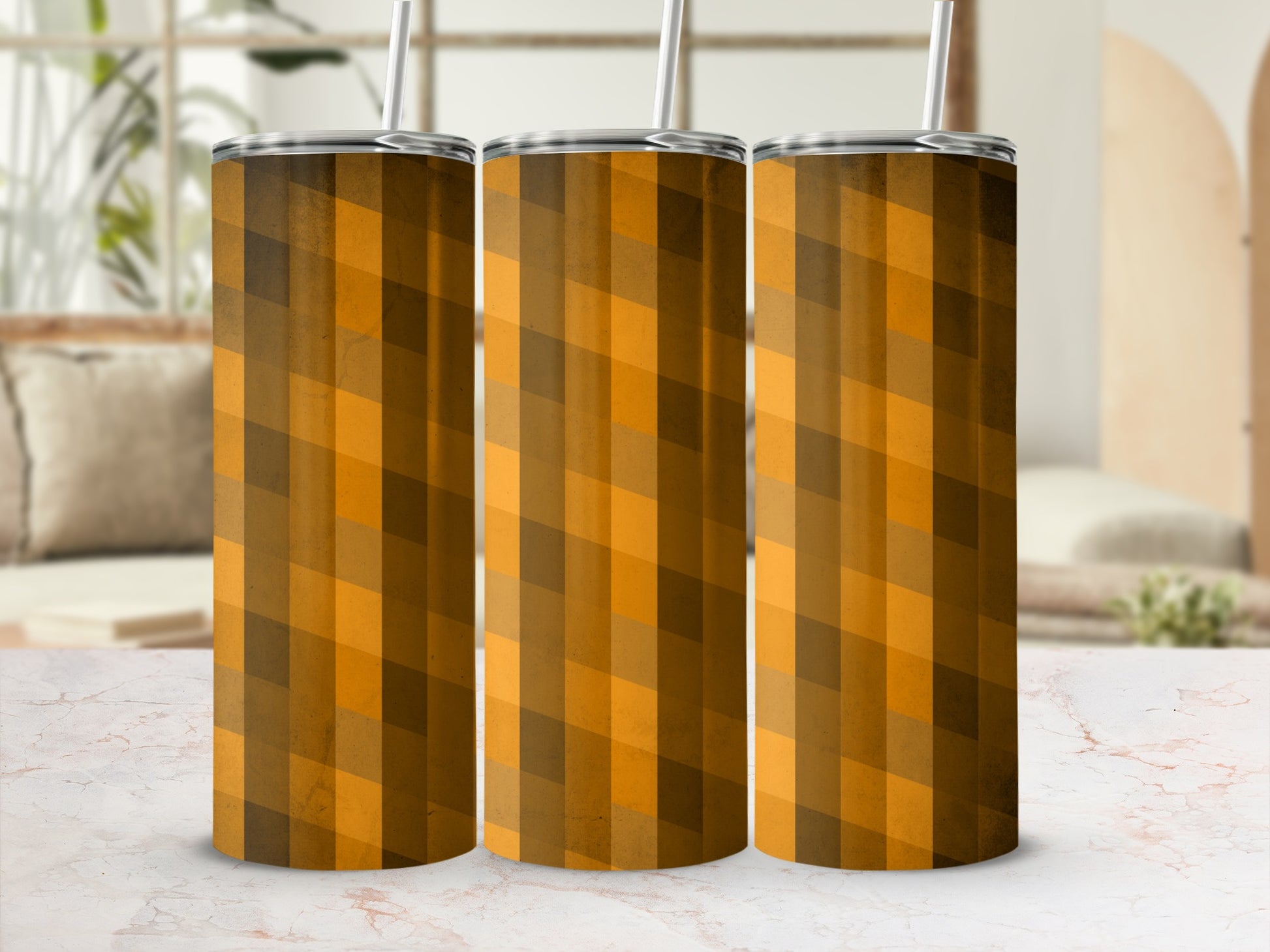 Three tumblers with a brown and orange geometric plaid pattern.