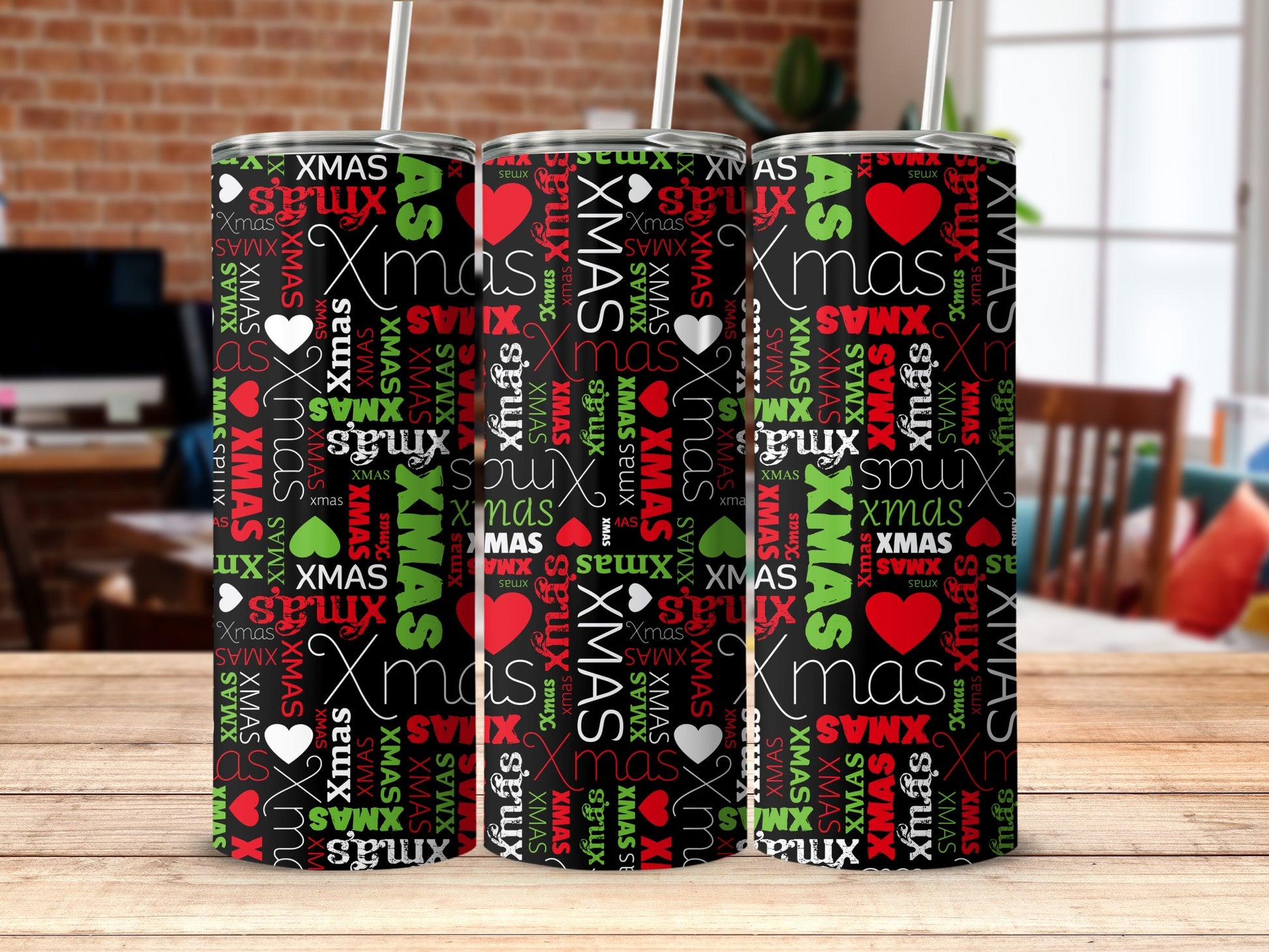 Christmas pattern tumbler with repeated "XMAS" text and hearts.