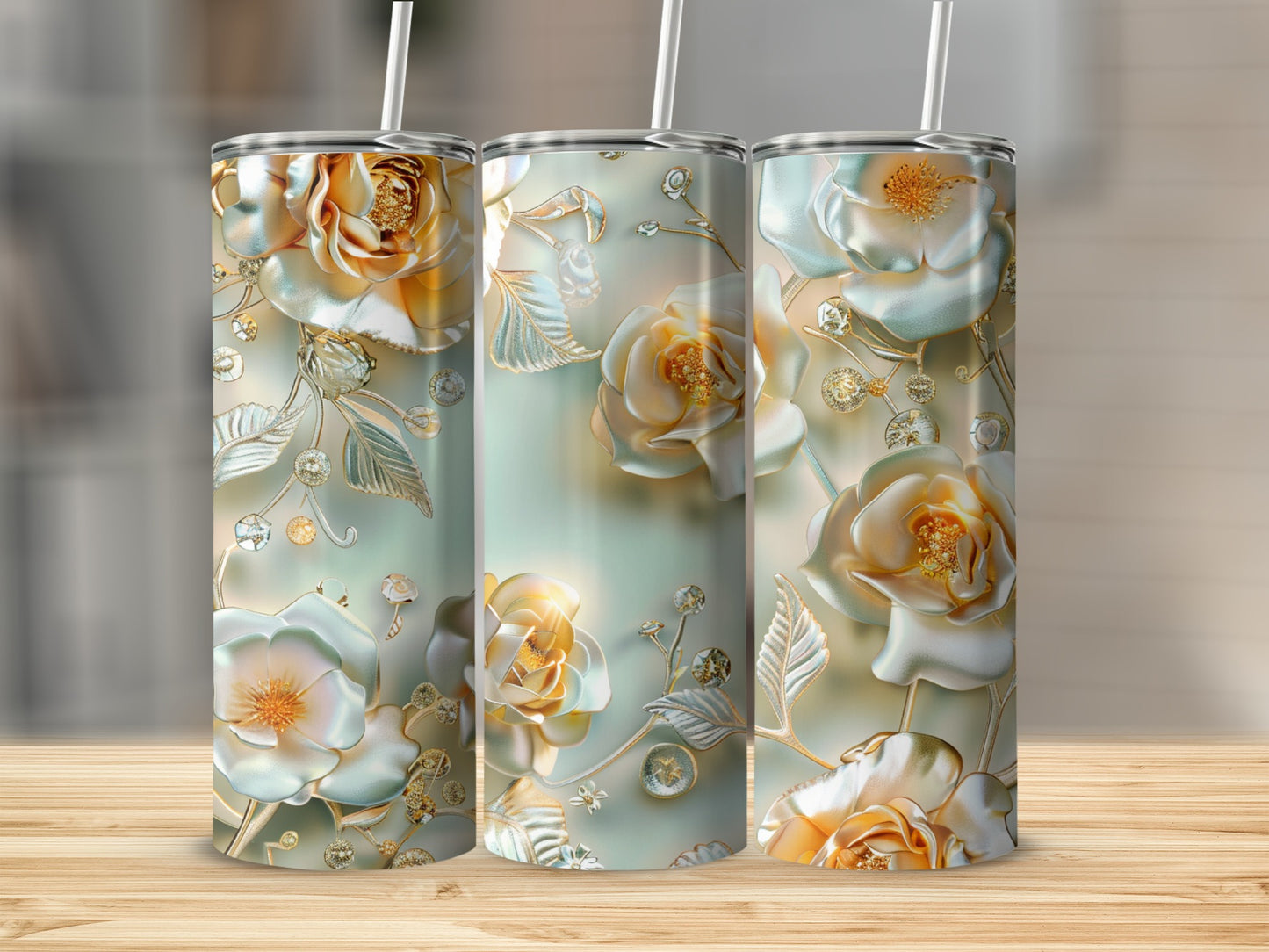 Three tall tumblers with embossed gold roses and pearl embellishments.
