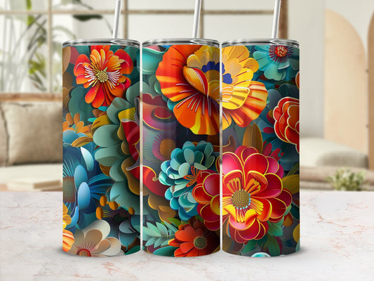 Three tumblers with vibrant floral patterns.