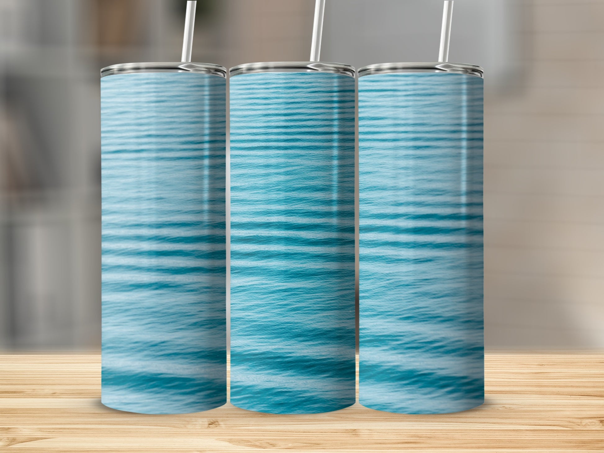 Three tumblers with a blue water ripple pattern.