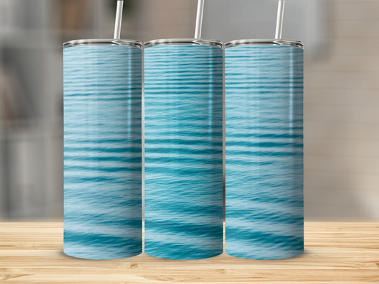Three tumblers with a blue water ripple pattern.