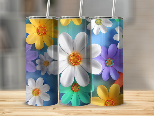 Three tumblers with floral designs in yellow, white, purple, and green.