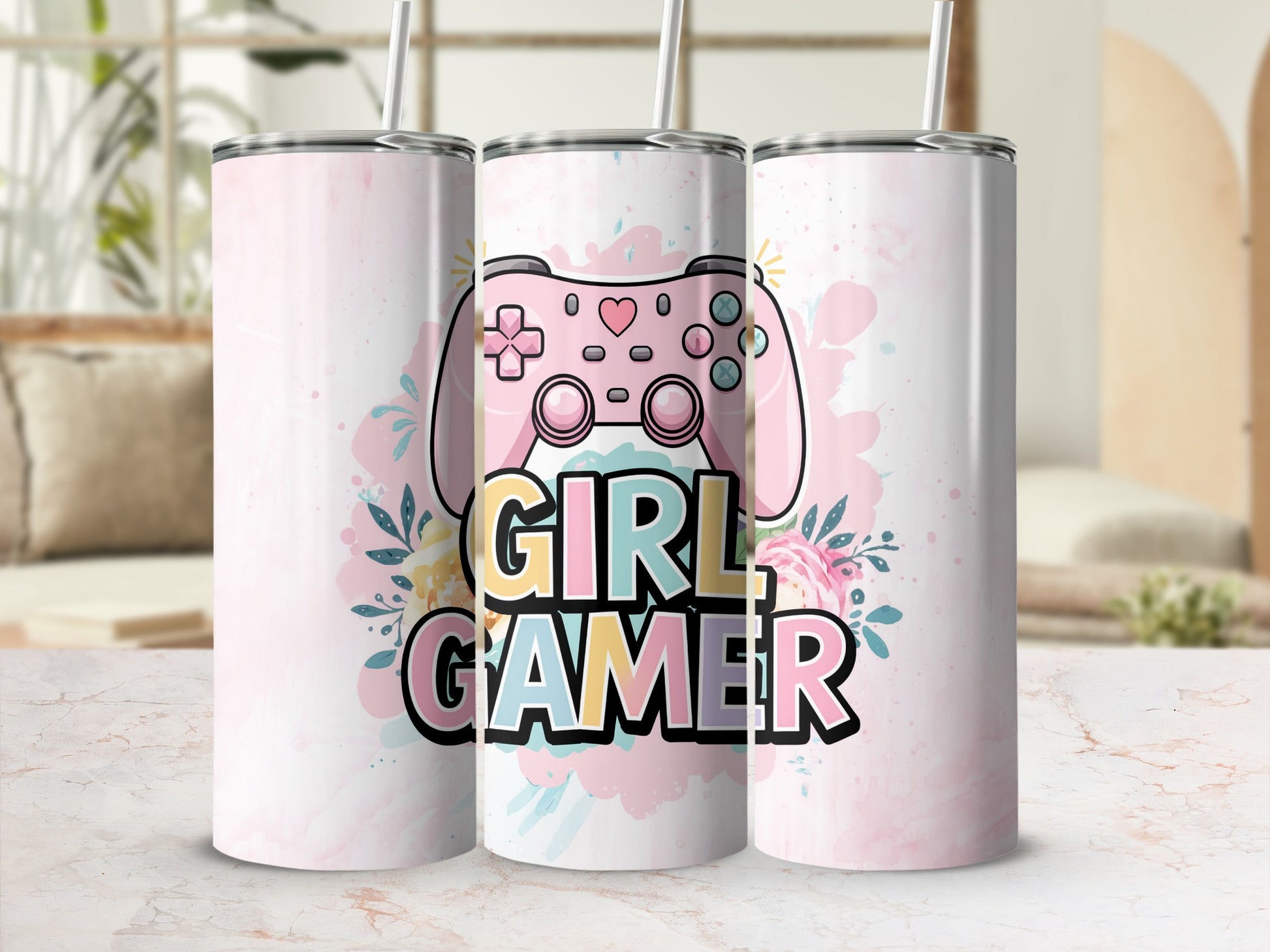 Pink tumbler with "GIRL GAMER" text and gaming controller design.