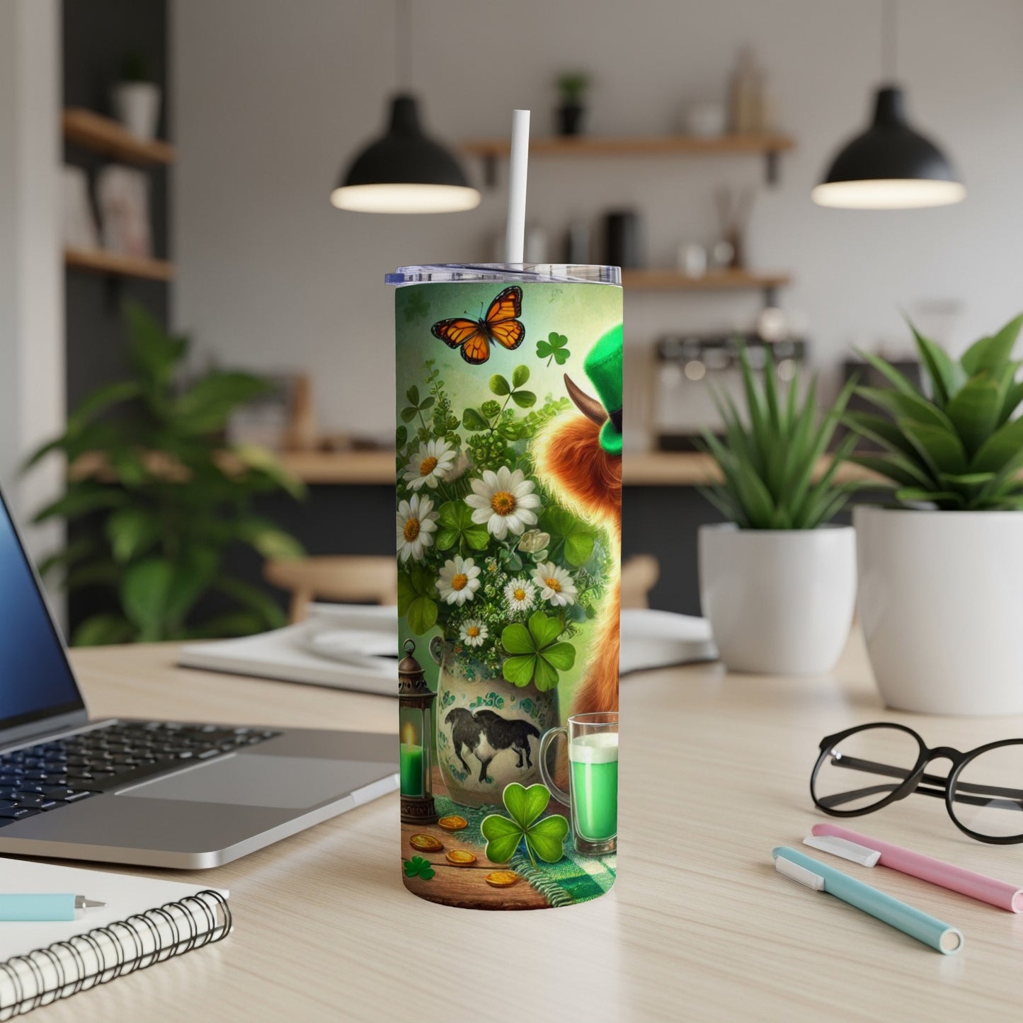 St. Patrick's Day themed tumbler with shamrocks, a cow, and coins.