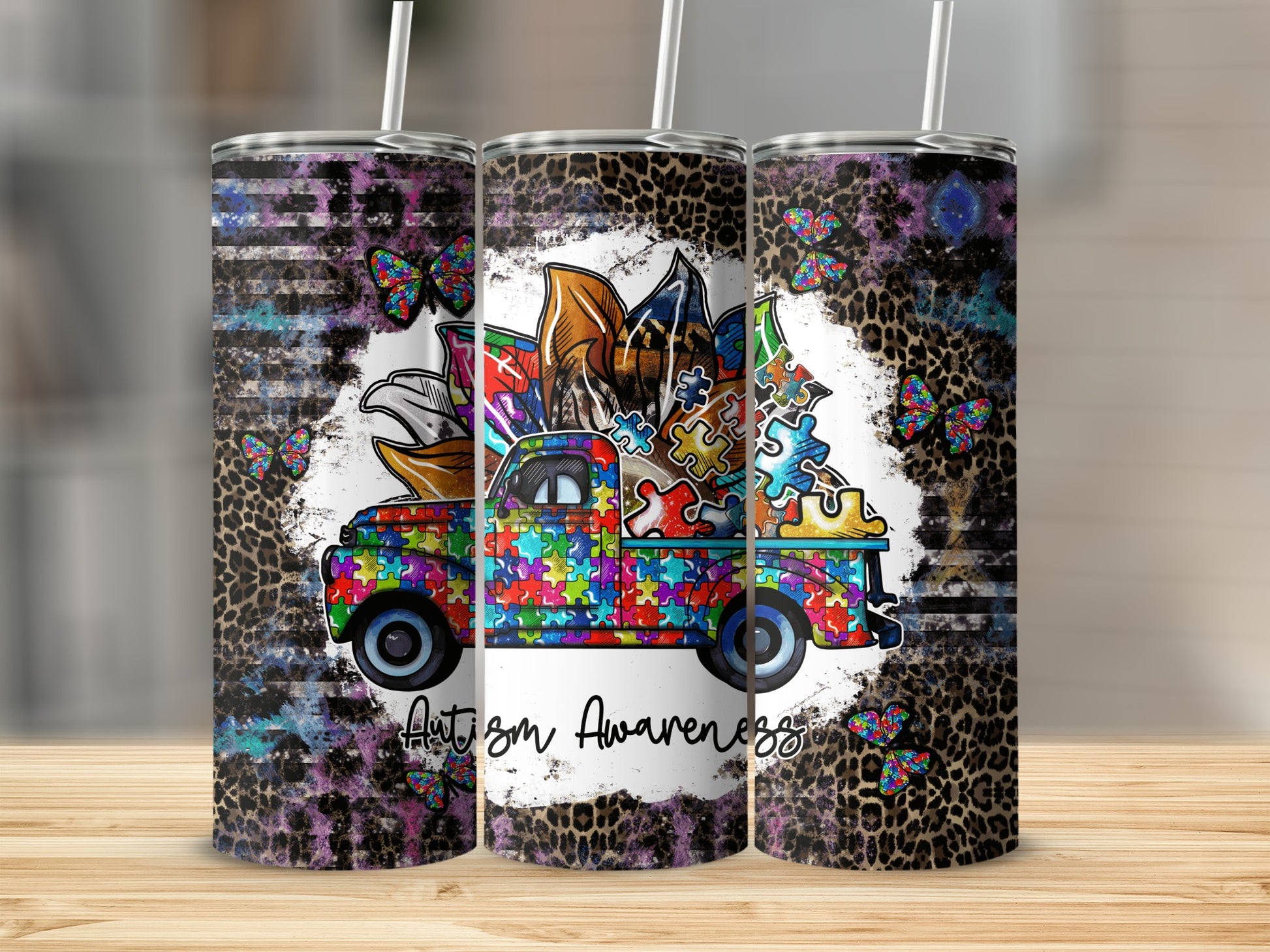 Triptych of tumblers featuring a colorful puzzle truck and butterflies.