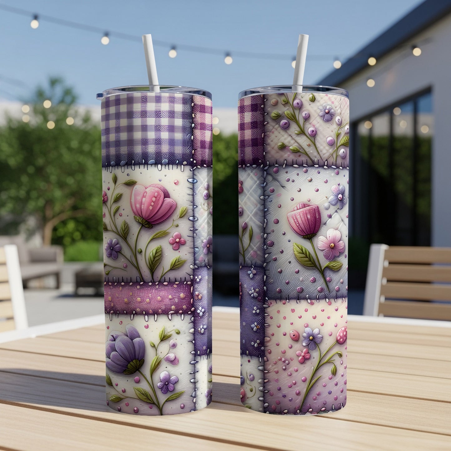 Two patterned tumblers with floral designs on a wooden table.