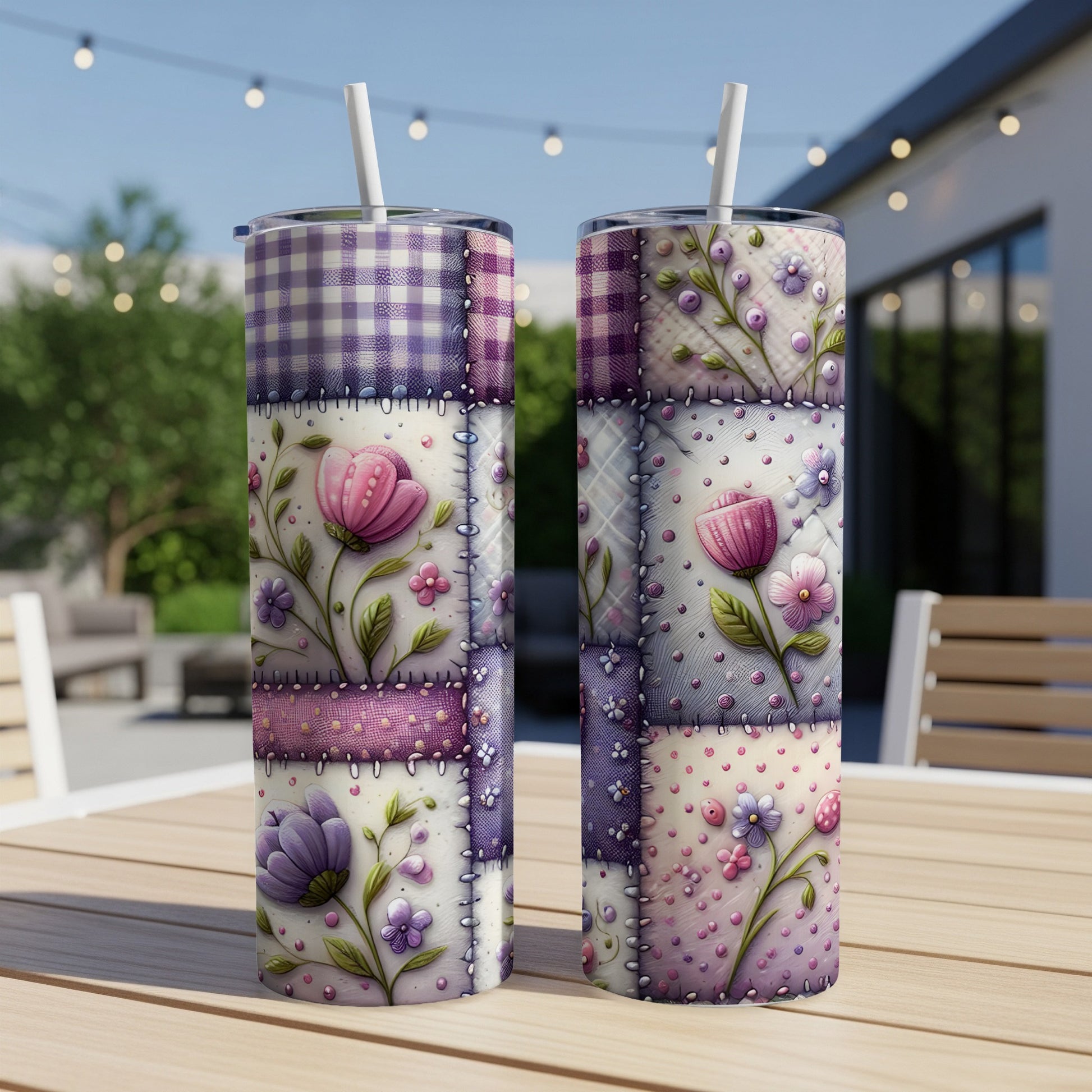 Two patterned tumblers with floral designs on a wooden table.