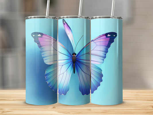 Tall blue tumbler with a large iridescent butterfly design.