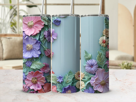 Three tumblers with embossed floral designs in pink, purple, and blue hues.