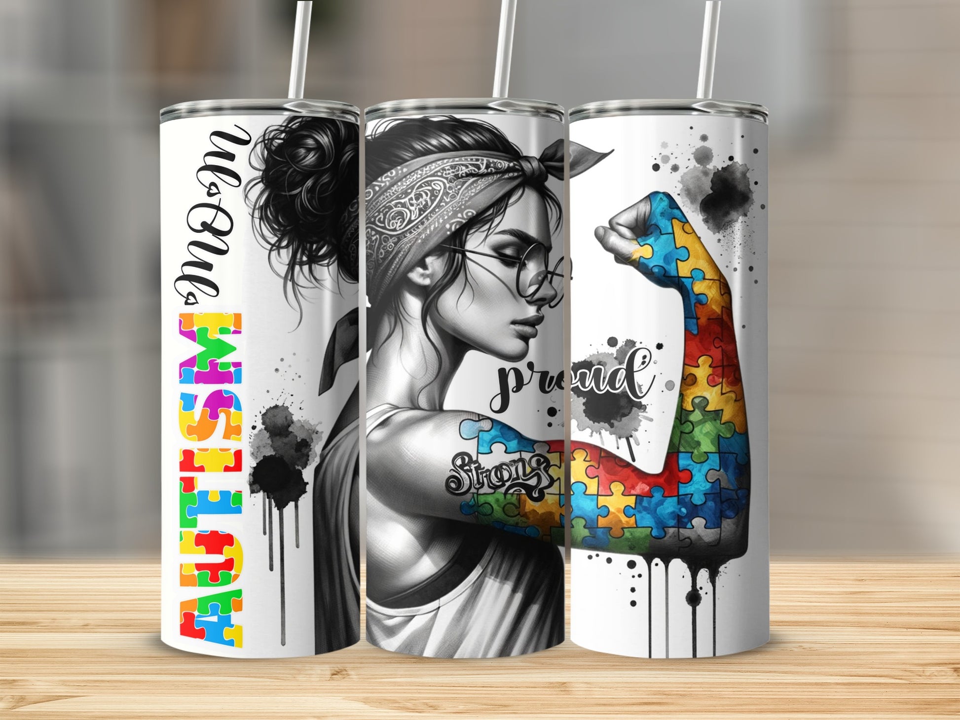 Tumbler with autism puzzle piece design and "Proud" text.