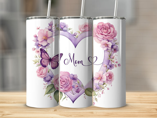 Floral heart with butterfly and "Mom" text on a tumbler.