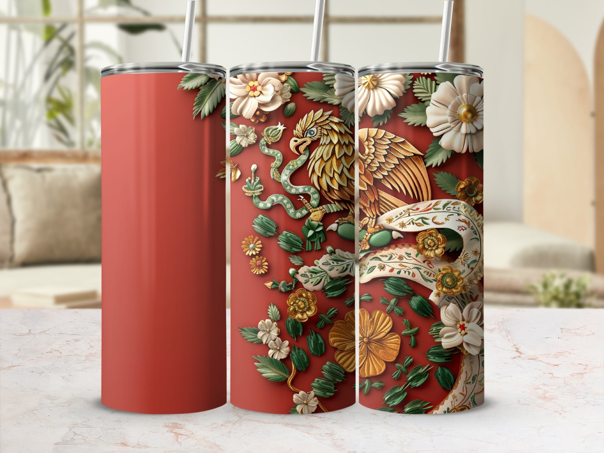 Red tumbler with intricate golden eagle and floral design.