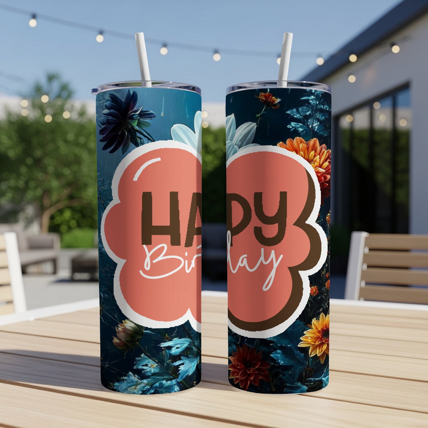Two tumblers with "Happy Birthday" in orange bubbles on a dark floral background.