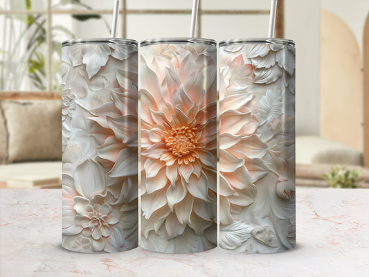 3D floral relief design tumbler with straw on marble surface.