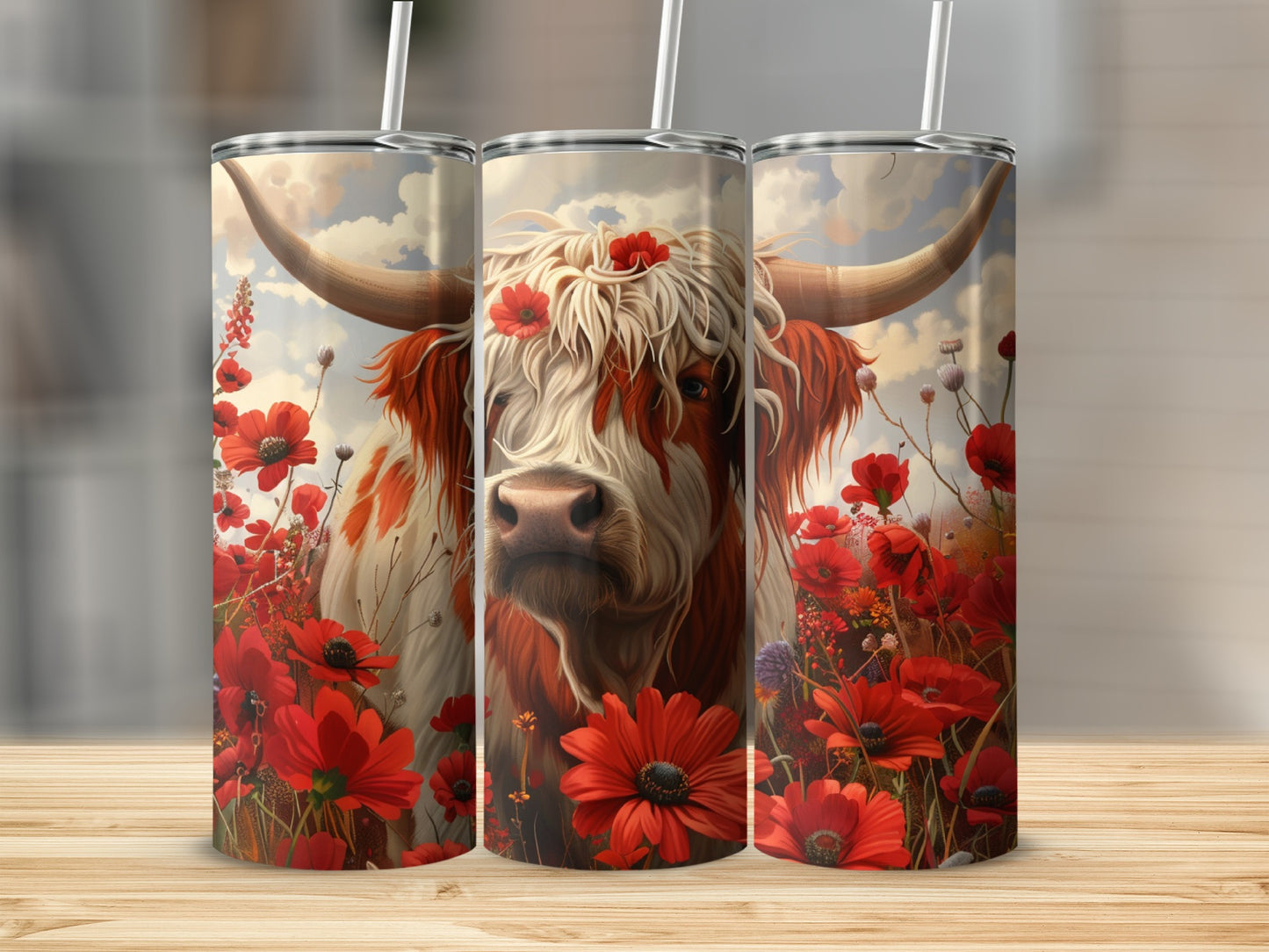 Highland cow with red poppies on a tumbler, with a white straw.