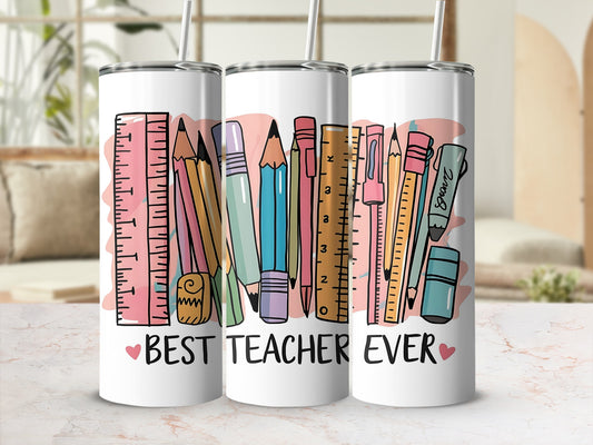 "Best Teacher Ever" tumbler with rulers and colorful pencils.
