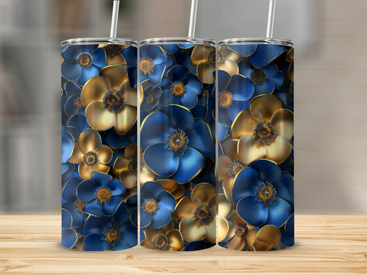 Three tumblers with a blue and gold floral design on a wooden surface.
