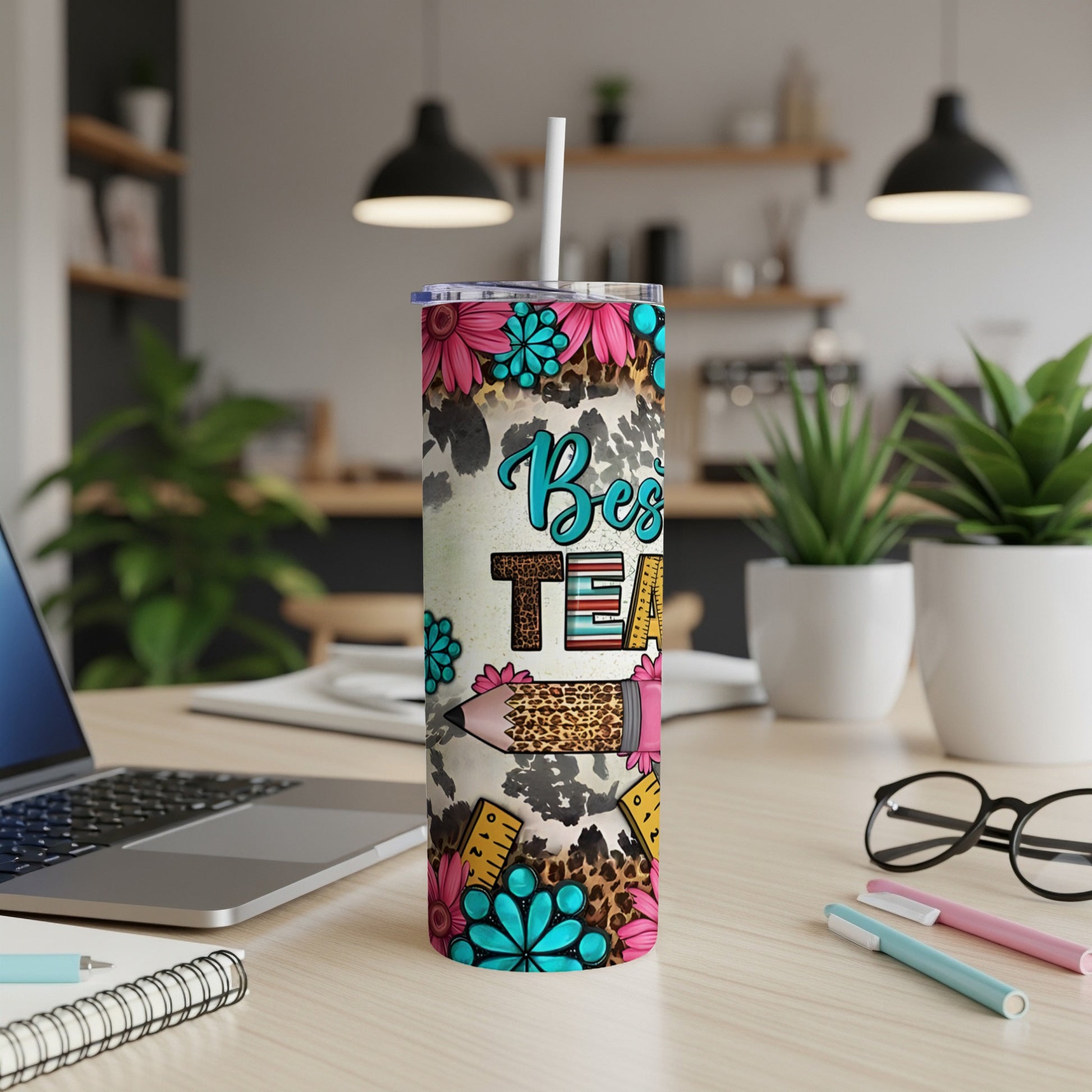 Leopard print tumbler with "Best Teacher" in floral and pencil design.