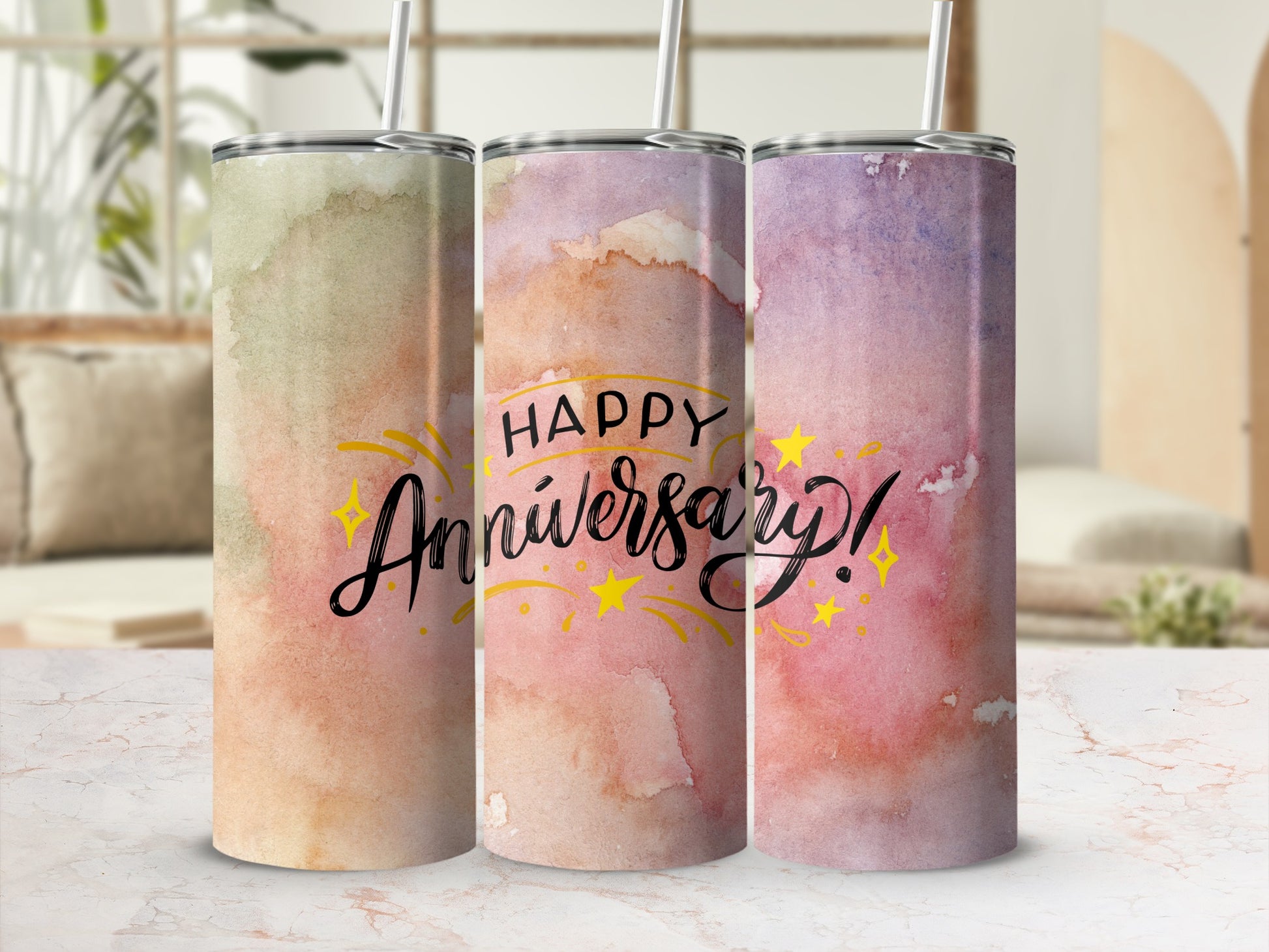 Three tumblers with watercolor designs and "Happy Anniversary" text.