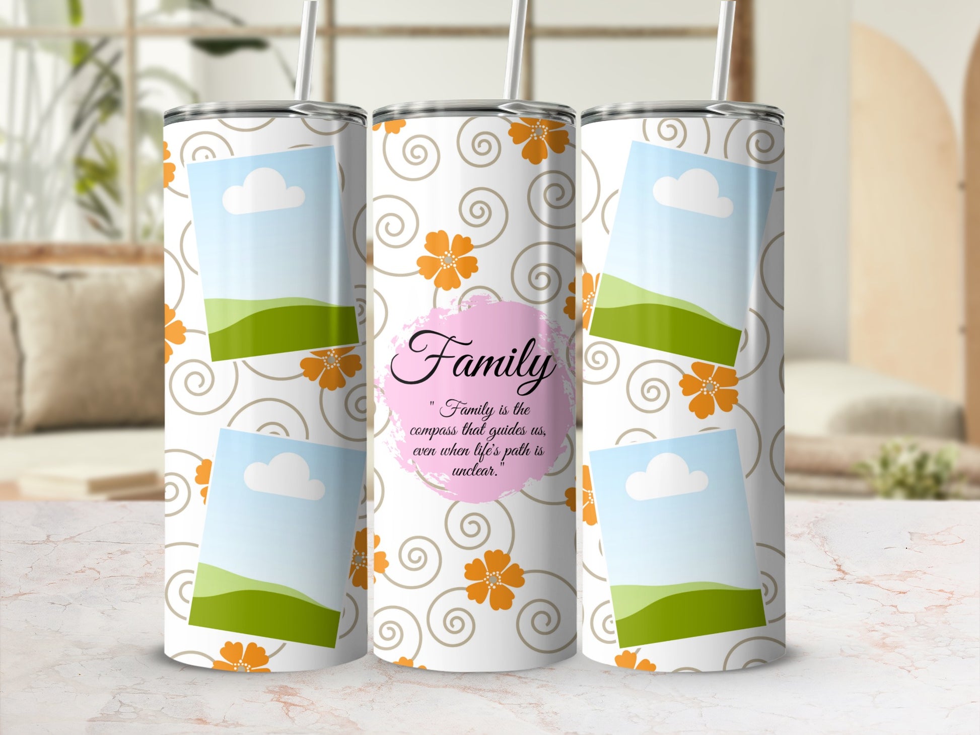 White tumbler with orange flowers, scrolls, and quote about family.