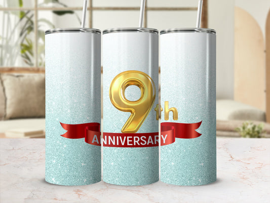Golden "9th Anniversary" text on glitter tumblers with red ribbon.