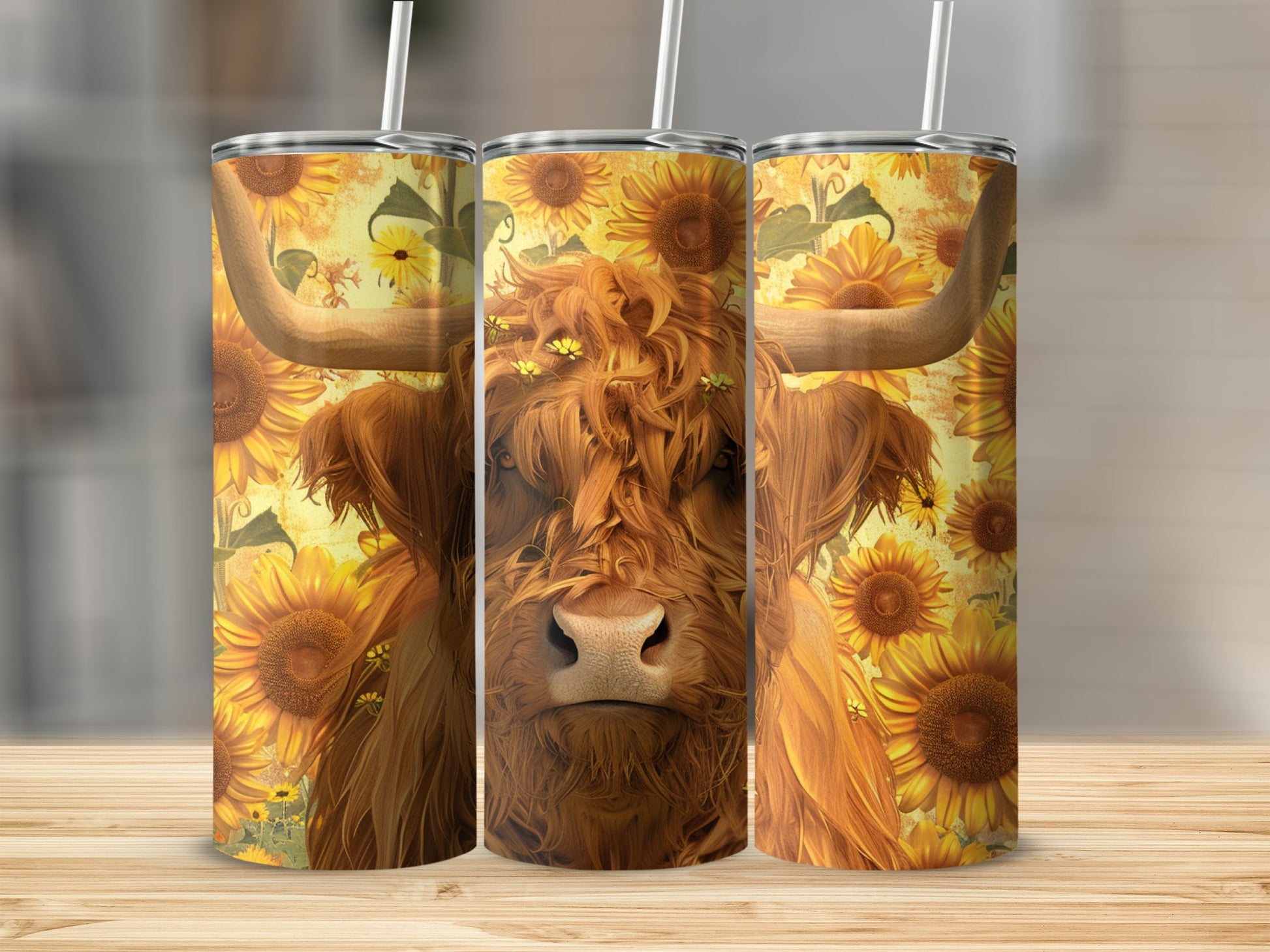 Three tumblers featuring a Highland cow surrounded by sunflowers.