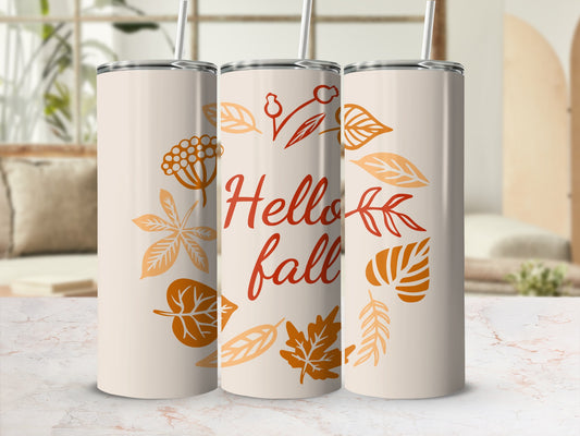 Three cream tumblers with "Hello Fall" and autumn leaf designs.