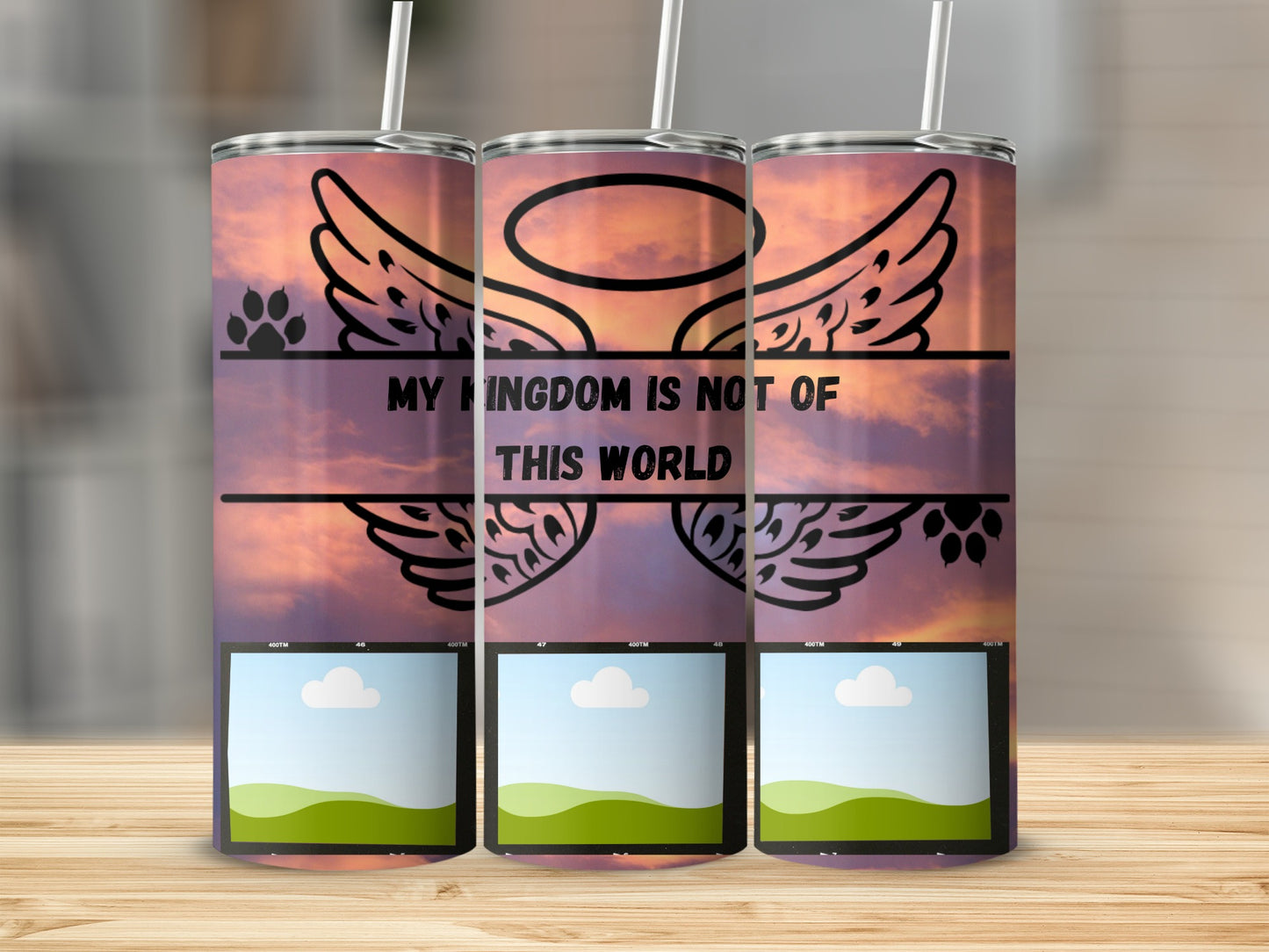 Tumbler with angel wings, paw prints, and "MY KINGDOM IS NOT OF THIS WORLD" text.