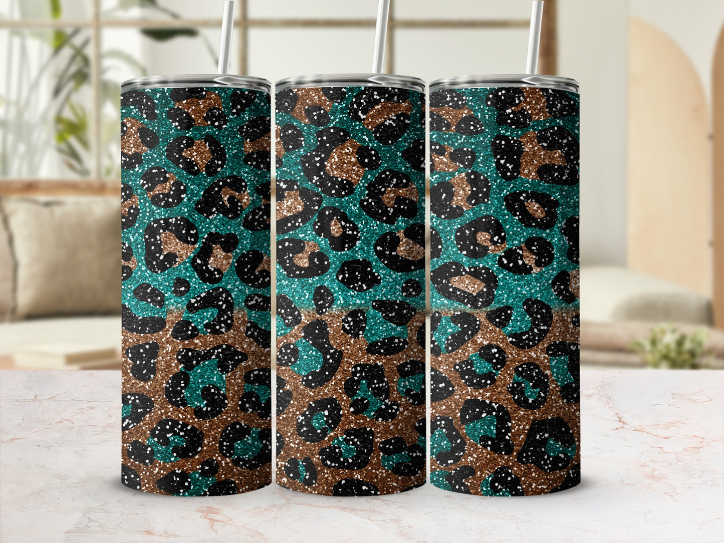 Three tumblers with a teal and brown leopard print glitter design.