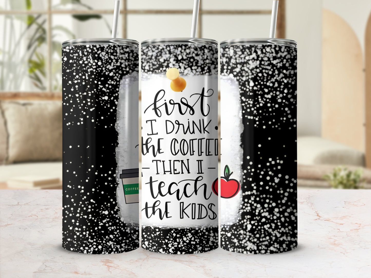 Black tumbler with white speckles and "First I drink the coffee, then I teach the kids" text.