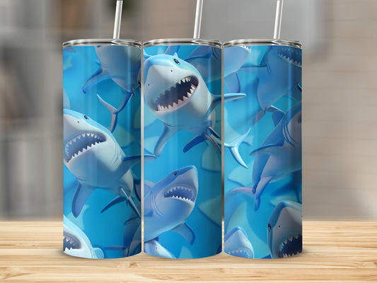 Three tall tumblers with cartoon sharks and blue water backgrounds.