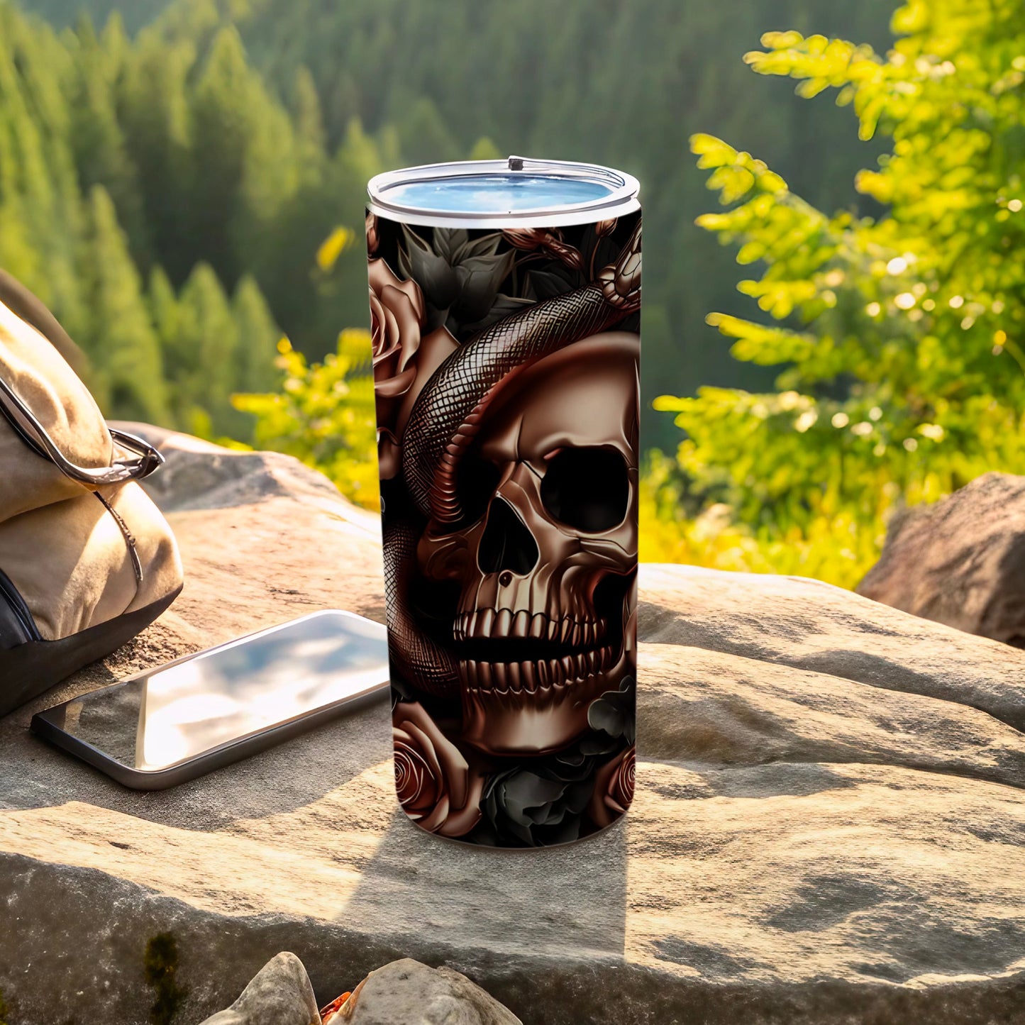 Skull and rose tumbler with snake, outdoors.