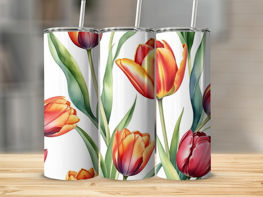 Three tumblers with a close-up floral pattern of red and yellow tulips.