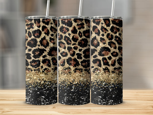 Three tumblers with leopard print and gold glitter on black.
